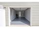 Attached one-car garage with painted floors, offering secure parking and storage at 577 Cypher Drive, Suwanee, GA 30024