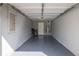 Clean, well-lit garage with painted floor, ready for parking or storage at 577 Cypher Drive, Suwanee, GA 30024