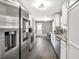 Bright kitchen featuring stainless steel appliances, granite countertops and tile backsplash at 577 Cypher Drive, Suwanee, GA 30024