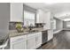 Kitchen featuring granite countertops, stainless appliances, and ample cabinet space at 577 Cypher Drive, Suwanee, GA 30024