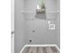 Laundry room featuring washer hookups and dryer hookups with a shelf for storing supplies at 577 Cypher Drive, Suwanee, GA 30024
