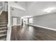 Bright, spacious living room with wood floors and lots of natural light is perfect for relaxation at 577 Cypher Drive, Suwanee, GA 30024