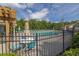 Community pool area with lounging chairs, tables, and shaded seating areas for residents at 577 Cypher Drive, Suwanee, GA 30024