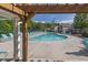 Community swimming pool with ample seating, providing a relaxing outdoor experience at 577 Cypher Drive, Suwanee, GA 30024