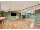 Finished basement featuring hardwood floors, a stone fireplace, and a wet bar at 63 Lewellen Dr, Marietta, GA 30064