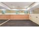 Spacious basement area with neutral paint, windows, carpet and access to storage closets at 63 Lewellen Dr, Marietta, GA 30064