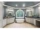 En-suite bathroom features a soaking tub, dual vanities, and abundant natural light at 63 Lewellen Dr, Marietta, GA 30064