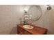 Elegant powder room features a wood vanity and decorative sink at 63 Lewellen Dr, Marietta, GA 30064