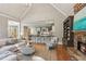 Open concept living space showcases the kitchen, fireplace, and vaulted ceiling at 63 Lewellen Dr, Marietta, GA 30064
