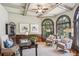 Bright, well-appointed office with coffered ceiling, statement windows, wainscotting, and stylish decor and natural light at 63 Lewellen Dr, Marietta, GA 30064