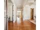 Inviting foyer boasts gleaming hardwood floors, high ceilings, and elegant architectural details at 1211 Thornwell Dr, Brookhaven, GA 30319