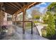 Inviting front porch boasts slate tile and is framed by manicured landscaping at 1211 Thornwell Dr, Brookhaven, GA 30319