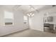 Elegant dining room with coffered ceilings and a view to the kitchen at 13567 Whitman Lane, Covington, GA 30014