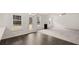 Living room with fireplace and wood floors at 13567 Whitman Lane, Covington, GA 30014