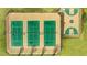 Aerial view of sports courts; three tennis courts and one basketball court at 13567 Whitman Lane, Covington, GA 30014
