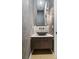Sleek powder room featuring a modern vanity, vessel sink, and stylish fixtures at 3293 Lenox Ne Pl, Atlanta, GA 30324