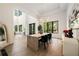 Bright dining room showcasing an open floor plan, modern chandelier, and elegant decor at 3293 Lenox Ne Pl, Atlanta, GA 30324