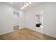 Bright hallway with hardwood floors leads to a luxurious bathroom at 3293 Lenox Ne Pl, Atlanta, GA 30324