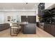 Open-concept kitchen with a large island, marble backsplash, and modern appliances at 3293 Lenox Ne Pl, Atlanta, GA 30324