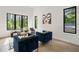 Bright office with hardwood floors, modern furniture, and expansive windows at 3293 Lenox Ne Pl, Atlanta, GA 30324