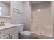 Bright bathroom with white fixtures, vanity, and shower-tub at 3851 Natalie Way, Ellenwood, GA 30294