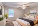 Relaxing bedroom with a comfortable bed, soft lighting, and modern decor at 3851 Natalie Way, Ellenwood, GA 30294