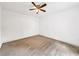 A well-lit bedroom with a ceiling fan and neutral carpet, offering a comfortable and versatile space at 644 Albert Nw St, Atlanta, GA 30318