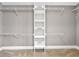 A walk-in closet with built-in shelving and storage, providing ample organization space at 644 Albert Nw St, Atlanta, GA 30318