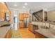 Gourmet kitchen featuring hardwood floors, stainless steel appliances, and granite countertops at 1040 Emory Parc Pl, Decatur, GA 30033