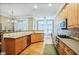 Well-lit kitchen with hardwood floors, plenty of counter space, and stainless steel appliances at 1040 Emory Parc Pl, Decatur, GA 30033
