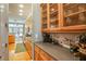 Long gourmet kitchen featuring hardwood floors and stainless steel appliances at 1040 Emory Parc Pl, Decatur, GA 30033