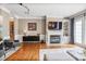 Cozy living room with fireplace, hardwood floors, and comfortable seating at 1040 Emory Parc Pl, Decatur, GA 30033