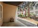 View of a private outdoor patio with trees and plants at 1040 Emory Parc Pl, Decatur, GA 30033