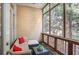 Relaxing screened porch with comfortable seating and view of surrounding trees at 1040 Emory Parc Pl, Decatur, GA 30033