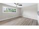 Bedroom with new flooring and natural light from the window at 1120 Taliwa Ne Trl, Marietta, GA 30068