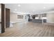 Spacious kitchen features grey cabinets, stainless steel appliances, large island and natural light at 1120 Taliwa Ne Trl, Marietta, GA 30068