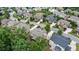 An aerial view shows homes lining the streets of this quiet, tree-filled neighborhood at 1980 Marcia Overlook Dr, Cumming, GA 30041