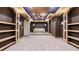 Finished basement theater with comfortable seating, perfect for entertainment and relaxing movie nights at 1980 Marcia Overlook Dr, Cumming, GA 30041