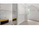 Spacious walk-in closet with metal shelving and carpeted flooring at 1980 Marcia Overlook Dr, Cumming, GA 30041