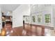 Open concept living area adjacent to a gourmet kitchen filled with natural light at 1980 Marcia Overlook Dr, Cumming, GA 30041