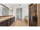 Luxurious main bathroom featuring a double vanity, walk-in shower, and separate soaking tub for ultimate relaxation at 1980 Marcia Overlook Dr, Cumming, GA 30041