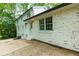 Charming home featuring an exterior with beautiful brick accents and a well-maintained yard at 280 E Valley Dr, Marietta, GA 30068