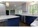 Bright kitchen with new appliances, stylish cabinets, white countertops, and view to a hallway at 280 E Valley Dr, Marietta, GA 30068