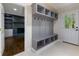 Mud room with a bench, cubbies, hooks, and view to the living room at 280 E Valley Dr, Marietta, GA 30068