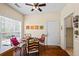 Breakfast nook with large window and decorative artwork at 380 Russell Rd, Lawrenceville, GA 30043