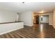 Bright and airy living room with open layout, featuring hardwood floors, neutral paint, and recessed lighting at 6480 Port A Prince Drive Dr, Forest Park, GA 30297
