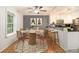 Eat-in kitchen and dining area features a ceiling fan and updated countertops at 1445 Monroe Ne Dr # F10, Atlanta, GA 30324