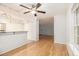 Inviting eat-in kitchen area open to living area, with hardwood floors and natural light at 1445 Monroe Ne Dr # F10, Atlanta, GA 30324