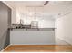 Modern kitchen with stainless appliances, granite counters, and open layout at 1445 Monroe Ne Dr # F10, Atlanta, GA 30324