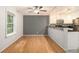 Eat-in kitchen area featuring stainless appliances, granite countertops, and modern track lighting at 1445 Monroe Ne Dr # F10, Atlanta, GA 30324